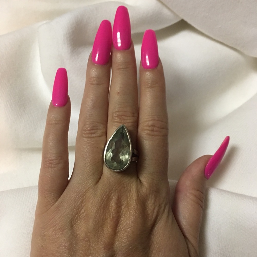 Sterling silver ring with light green stone